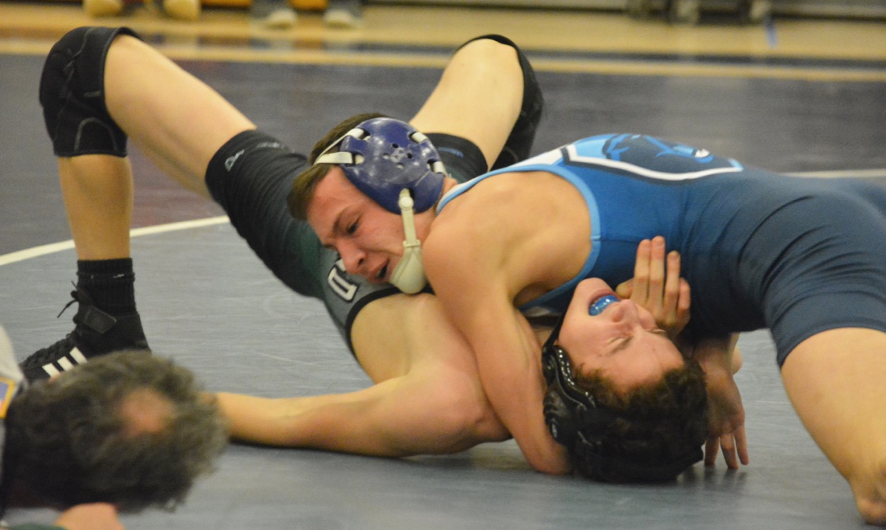 Jake Carlucci opened the night with a pin for the Panthers, but Franklin was forced to battle in every match to win the dual meet against Mansfield. (Josh Perry/HockomockSports.com)