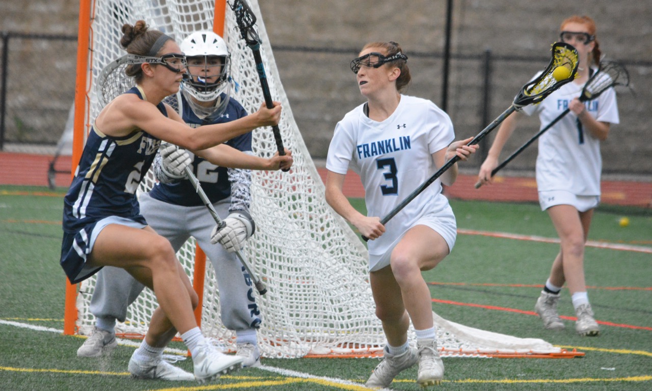 Franklin junior Annie Walsh (3) and her sister Erin each scored four goals to lift Franklin to a victory against Foxboro in a battle of league champions. (Josh Perry/HockomockSports.com)