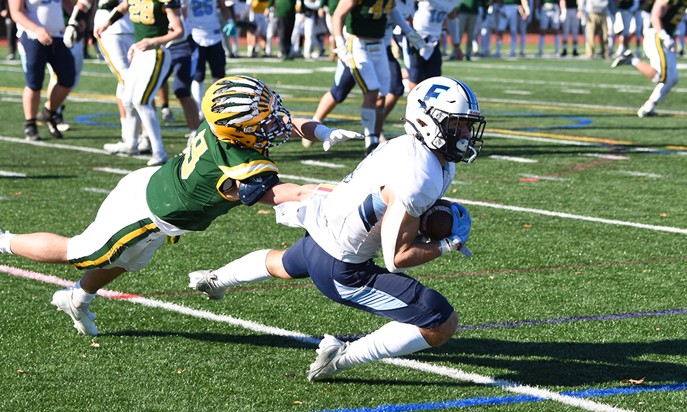 Franklin senior Luke Davis (6) hauls in a two-point conversion with 2:46 remaining, which lifted the Panthers to a come from behind win at rival King Philip and to a second straight Kelley-Rex title. (Josh Perry/HockomockSports.com)