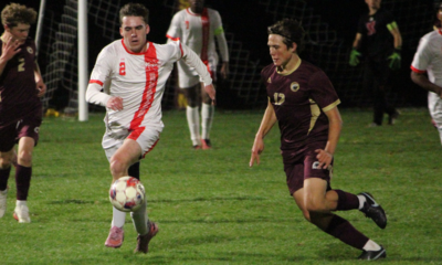 North Attleboro boys soccer North Attleboro's Zach Goulart (2) looks to get past Sharon's Prithvi Siva (12) during Tuesday's game.