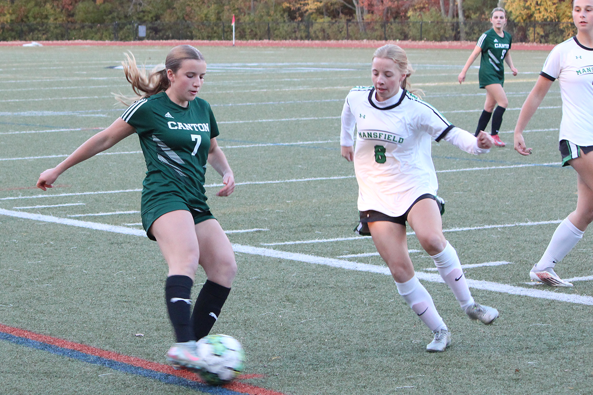 Canton girls soccer Natalie Erickson and Mansfield's Sarah Jones